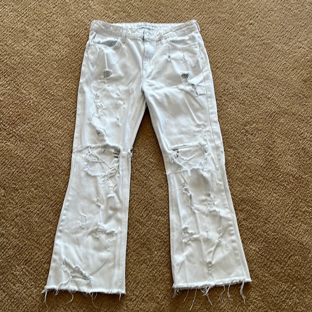 Zara, extremely distressed, mid-rise, white, bootcut jeans